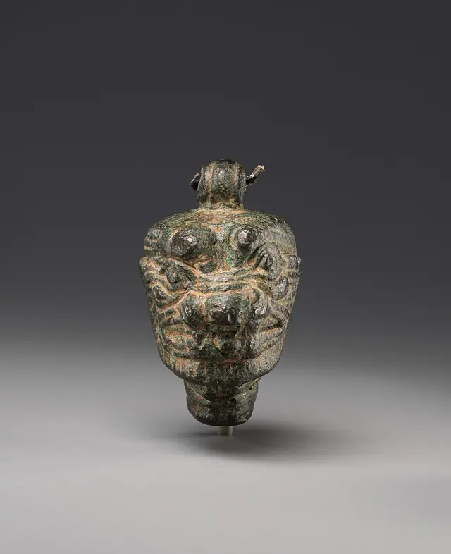 Mesopotamian pendant with the head of Pazuzu