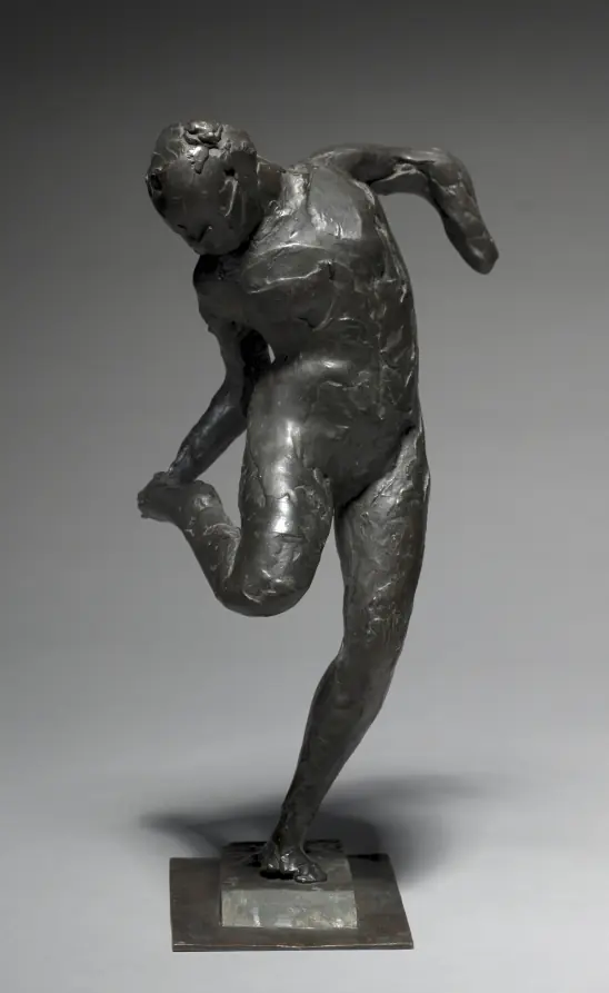 Dancer Looking at the Sole of her Right Foot