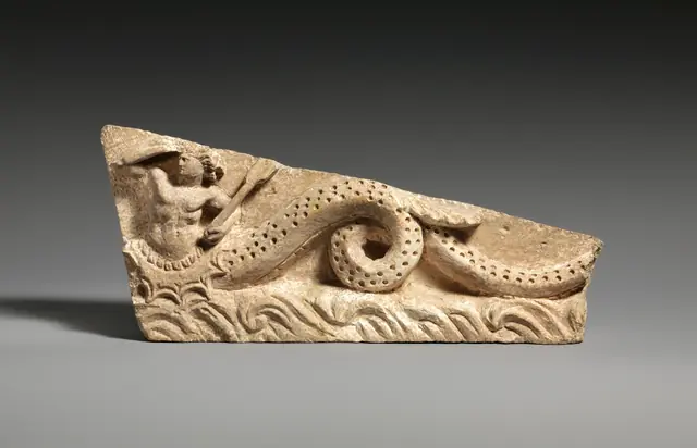 Limestone pediment fragment