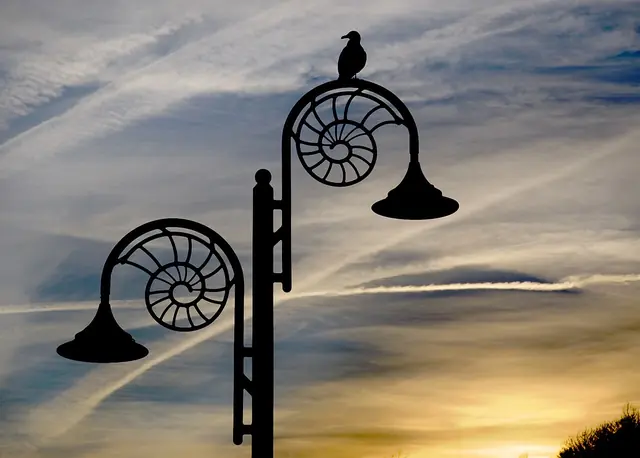 Ammonite lamp post at dusk, Lyme Regis