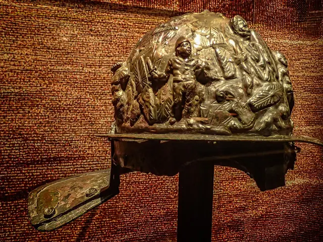 Ornate Roman gladiator helmet with relief including an eagle and Priapus found in the gladiator barracks in Pompeii 1st century CE 01