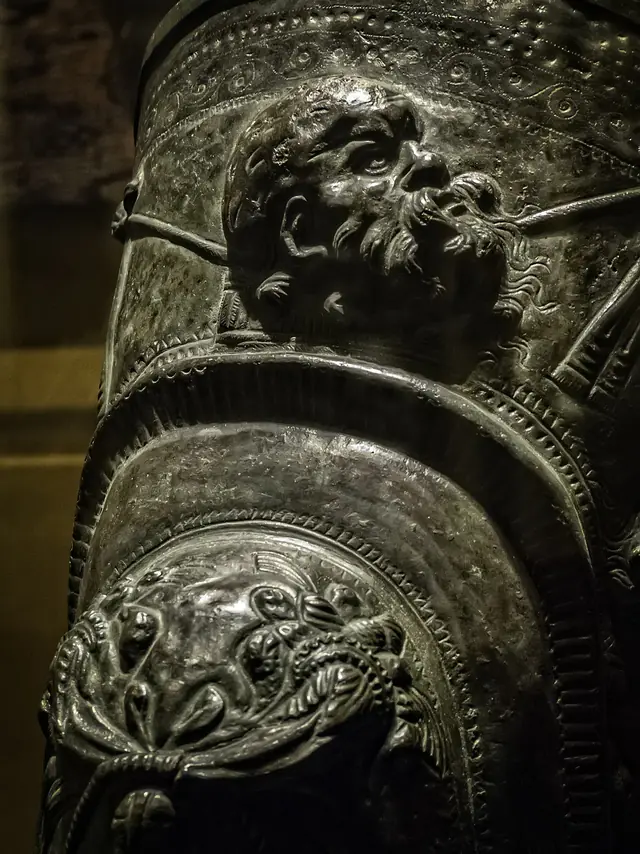 Closeup of Silenus on ceremonial gladiator shin guard from the gladiator barracks in Pompeii 1st century CE
